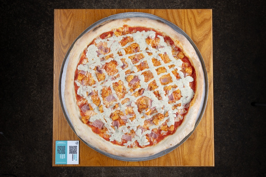 Commercial food photography of artisan pizza