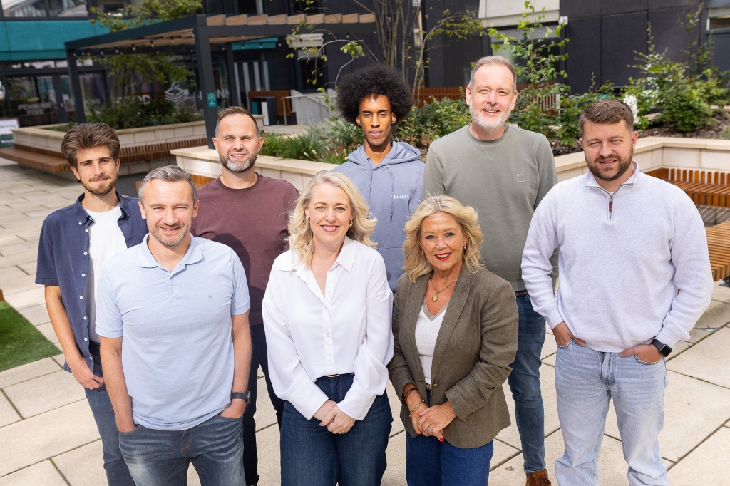 Corporate team portrait for QuickSMS